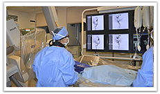 two doctors in an operating room using screen guided imagery