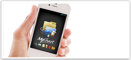 Hand holding a smart phone with MyChart logo
on screen